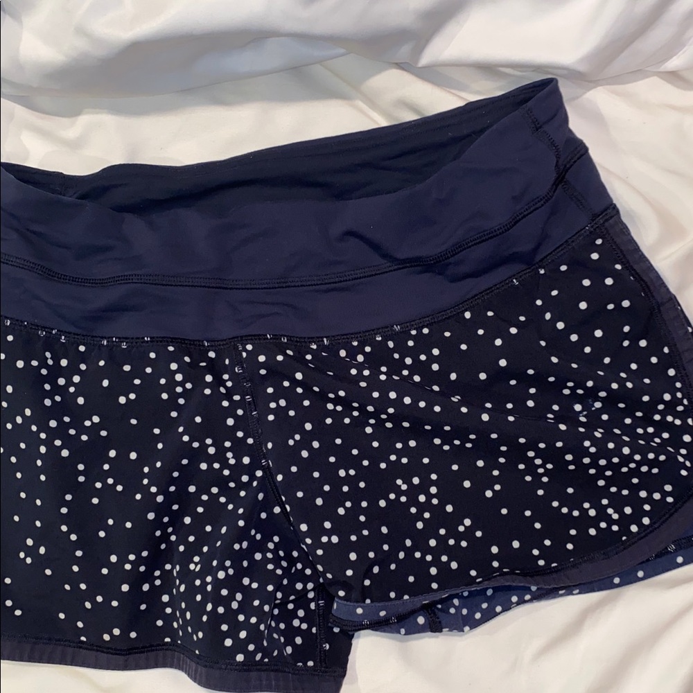Lululemon tracker shorts. Navy and white.